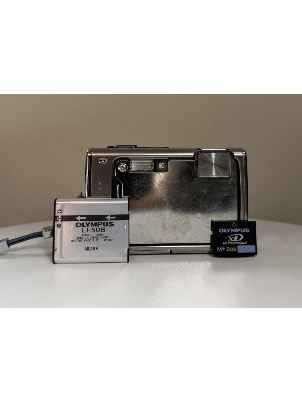 Olympus Stylus 1030SW 10.1MP Digital Camera Water/Shockproof Battery & 2GB SD